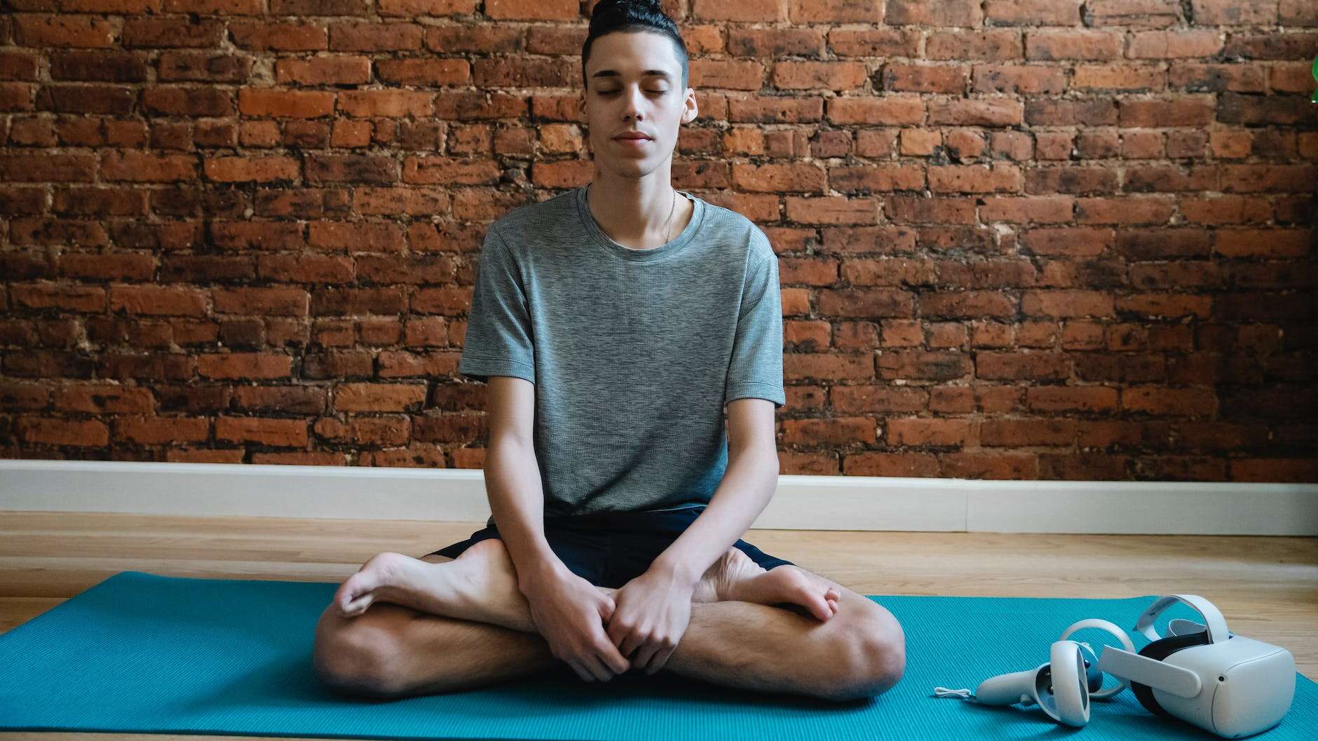 teen meditating in lotus pose